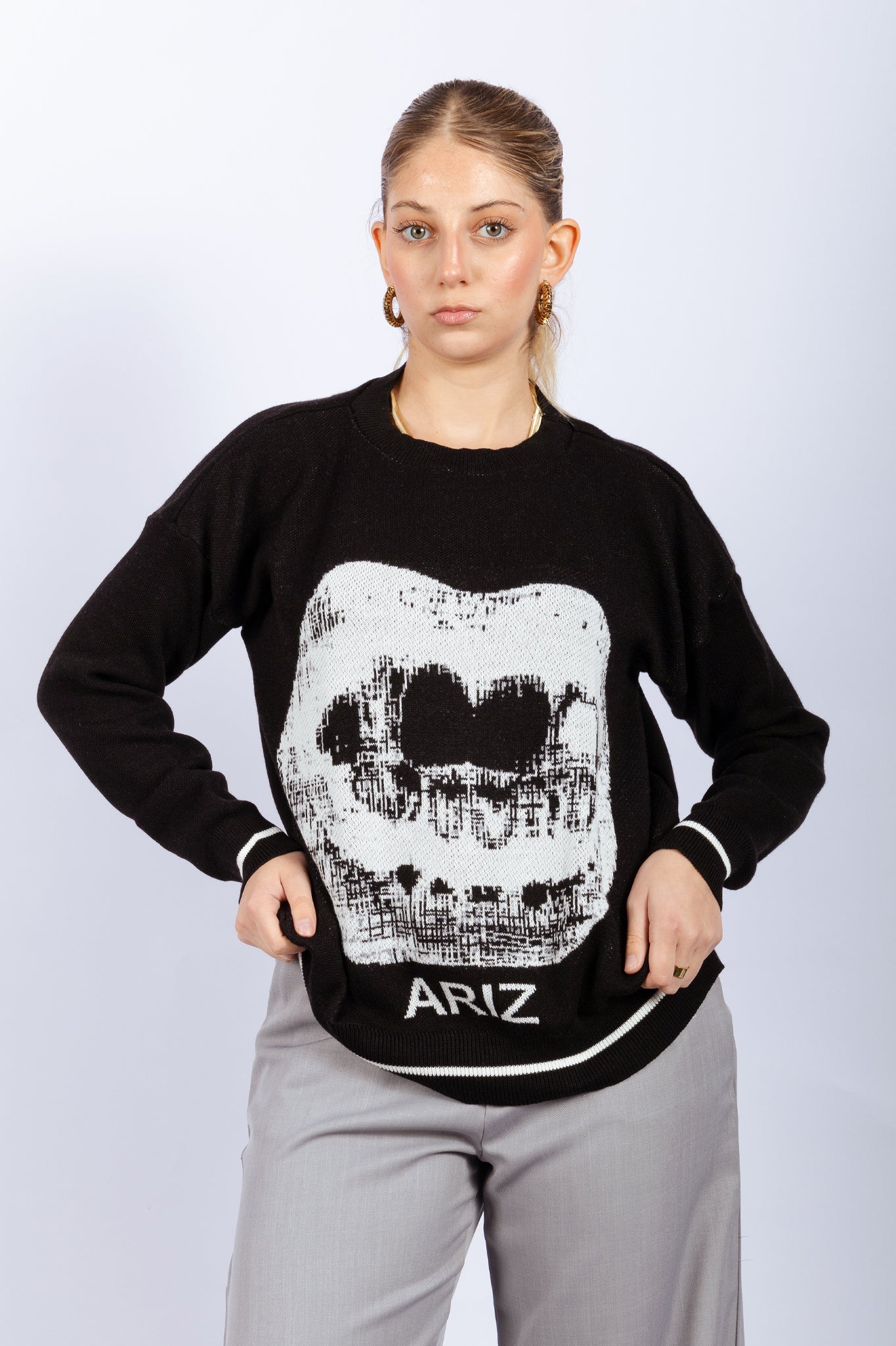 SWEATERS